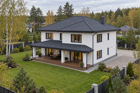 Монтаж композитной черепицы LuxArd Roman Grand графитового цвета на доме из газобетона 220 м² в Красногорске